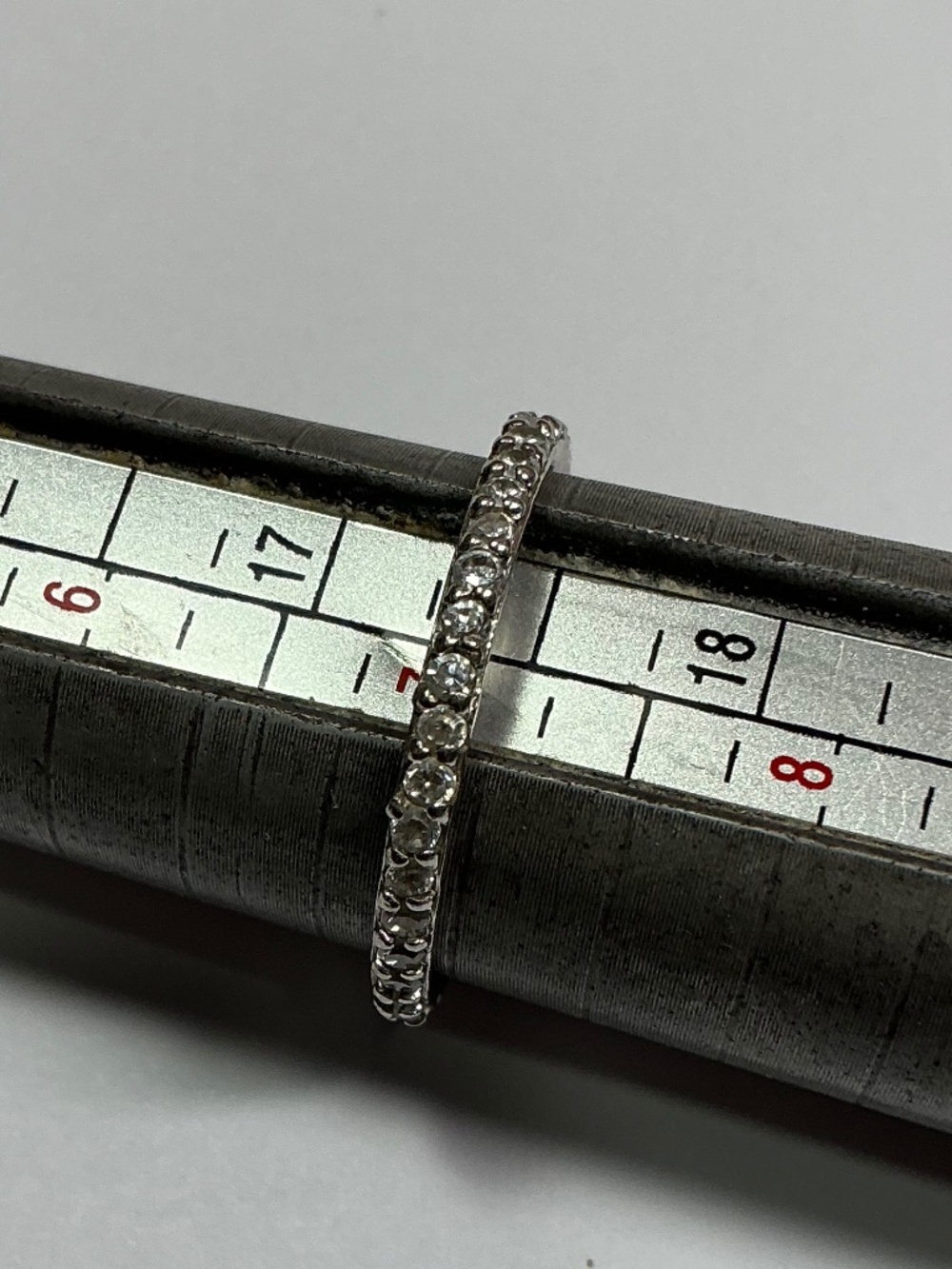 FAS Sterling Silver Ring with clear stones. Size 7
